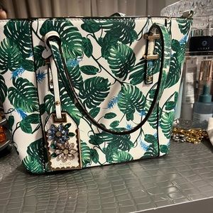 Beautiful aldo green and white greenery purse